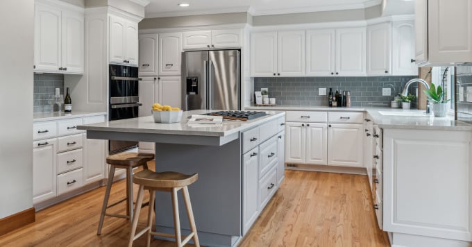 Why is coordinating materials important in a kitchen remodel